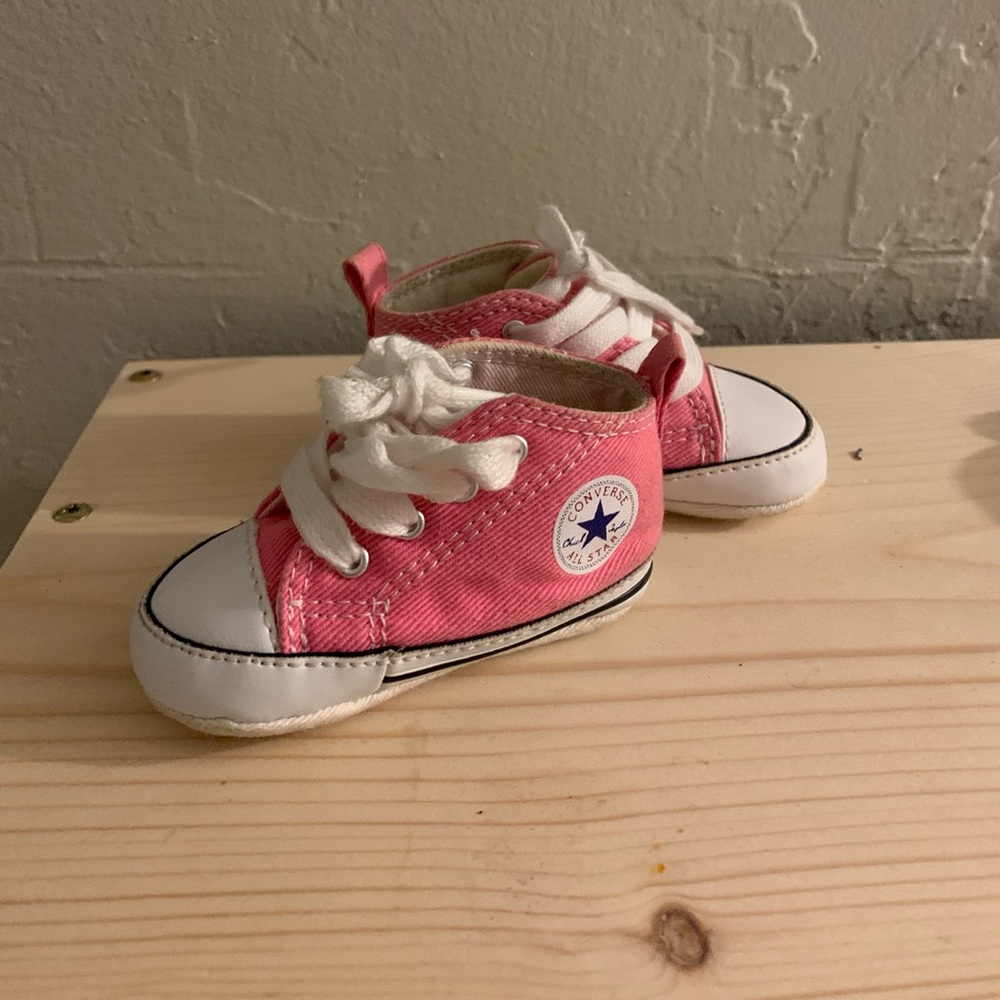 Baby pink converse shoes
